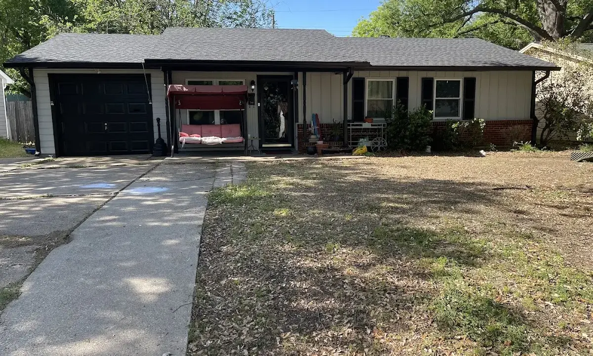 Roof Replacement crew at work on a residential roof in Arkadelphia